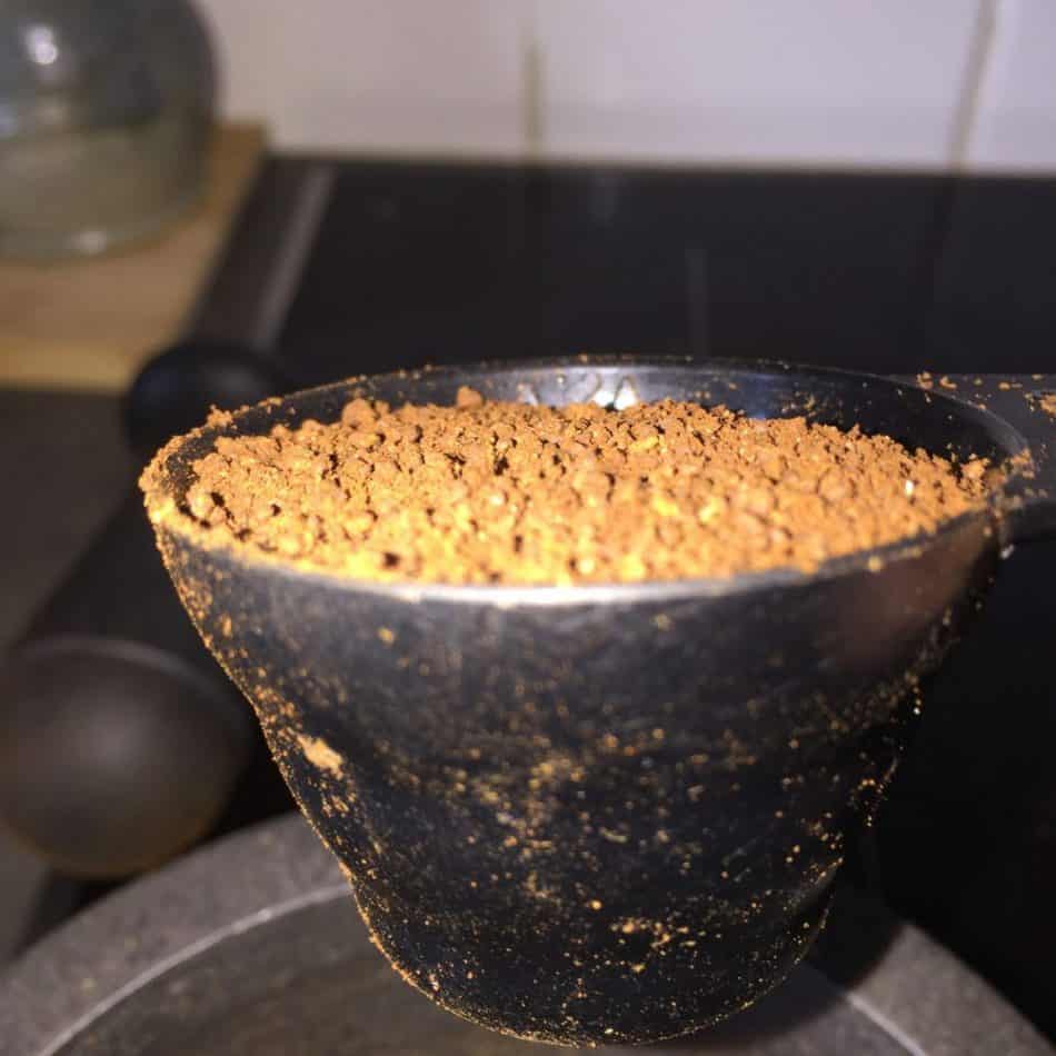 scoop of ground coffee